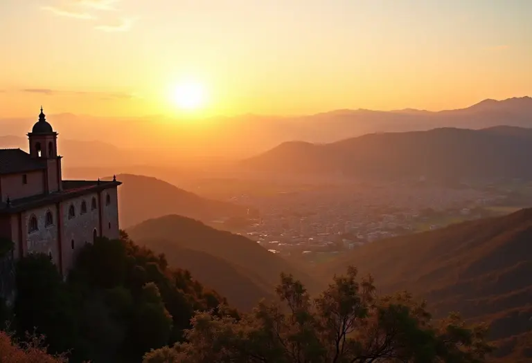 Vista panorâmica de Ouro Preto ao pôr do sol, destacando a arquitetura colonial.