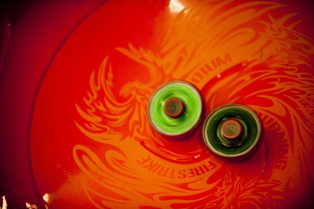 Lembrancinha Beyblade: A Surpresa Perfeita para Fãs Beyblades collide during the Beyblades Battle Tournament April 18, 2012, at Incirlik Air Base, Turkey. A Beyblade is a spinning top that is launched i